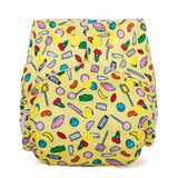 Yellow cloth nappy with bright retro sweets design